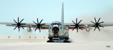 An LC-130 equipped with special 8-blade NP2000 propellers visits Summit Station, Greenland. Test flights such as this one suggest the 8-blade propellers will allow these cargo planes to take off on skis with much heavier cargo loads than do the standard 4-blade propellers. Photo: Mark Doll, USAF